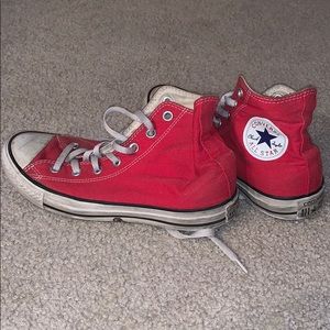 Red converse high tops